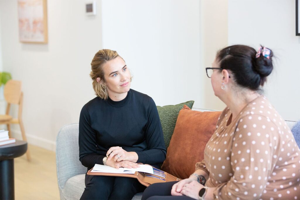 Physiotherapist Nadia providing a physiotherapy consultation to a patient for obesity physio and larger body physio at Laneways Rehabilitation.